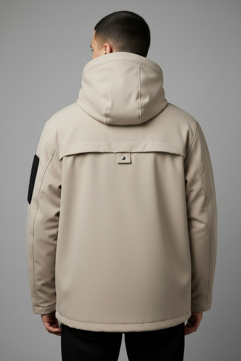 Beige/tan utility jacket with black accents - back view