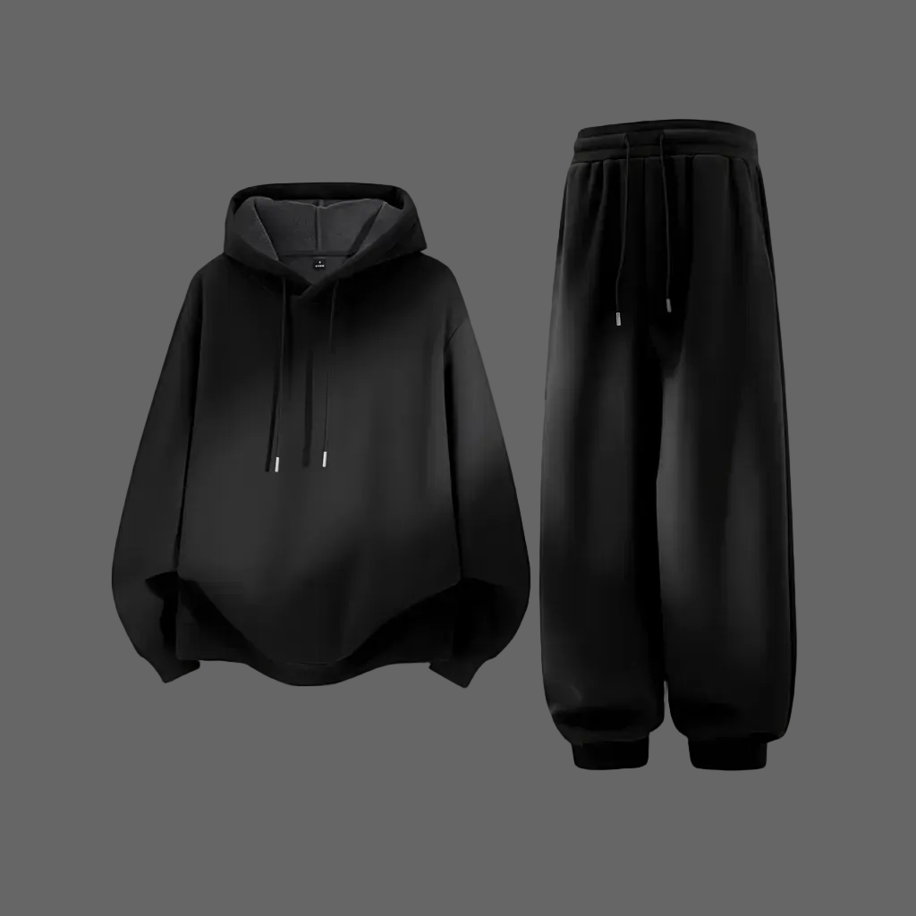 Black hoodie and joggers - flat lay with grey background