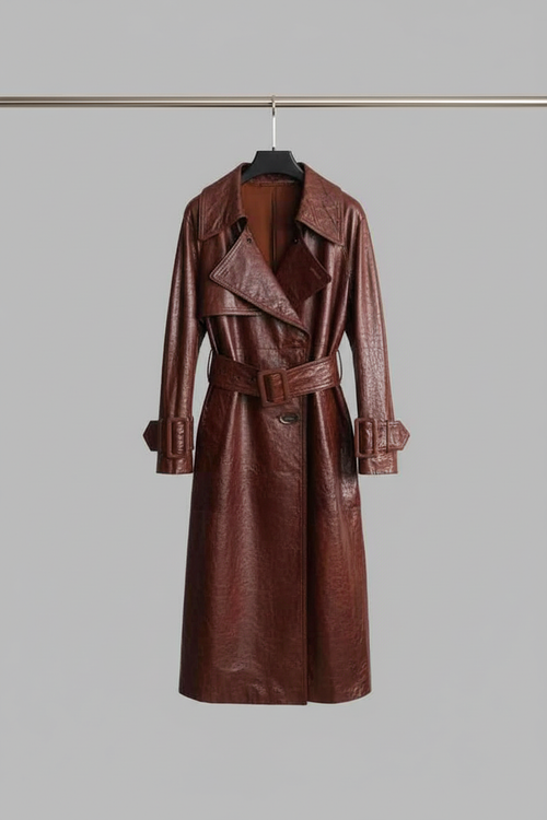 Brown leather trench coat on hanger