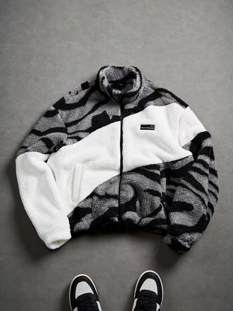 lack Plush Jacket with a Zip-Up Collar And Double Pockets, Featuring a Striking Zebra Pattern.