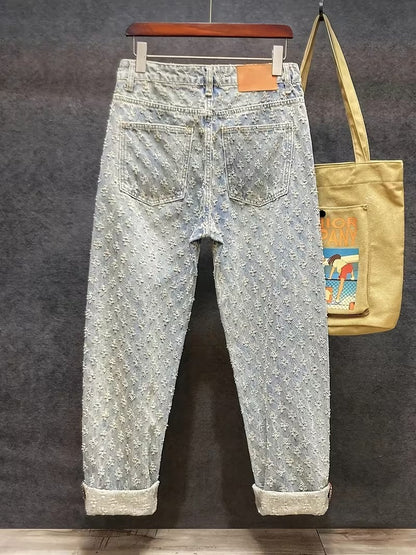 Light Blue Denim Jeans with Washed Detail and Jacquard Pattern